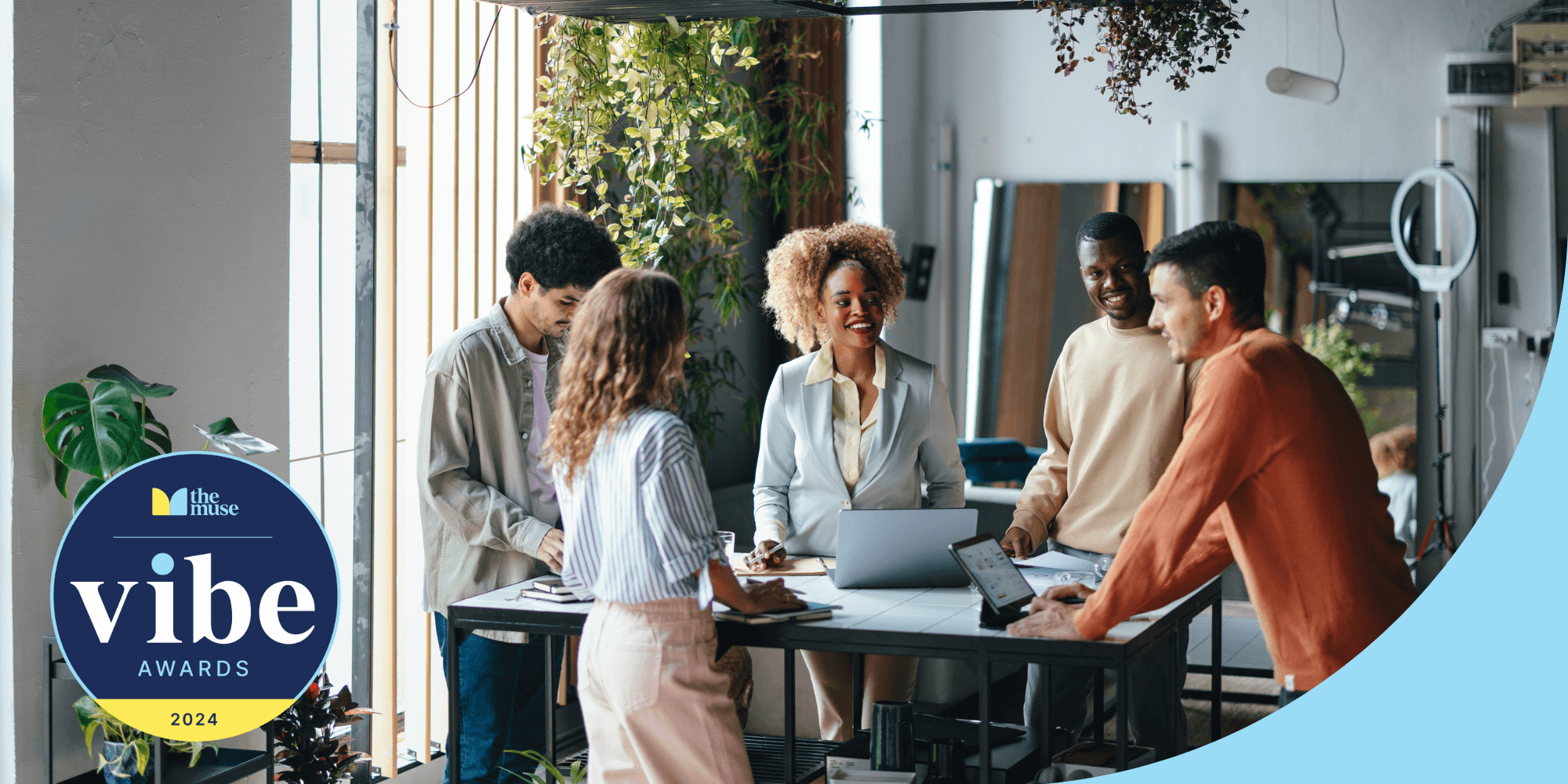 Work team gathered around a table for a meeting.